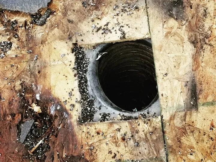 Exhaust vent pipe deterioration on roof deck