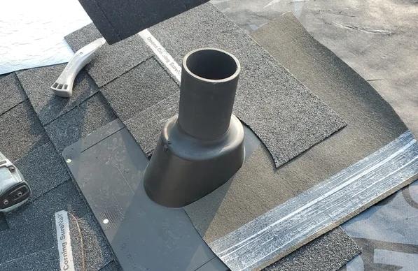 Plumbing stack flashing installation on roof